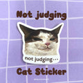 Judging Cat Sticker